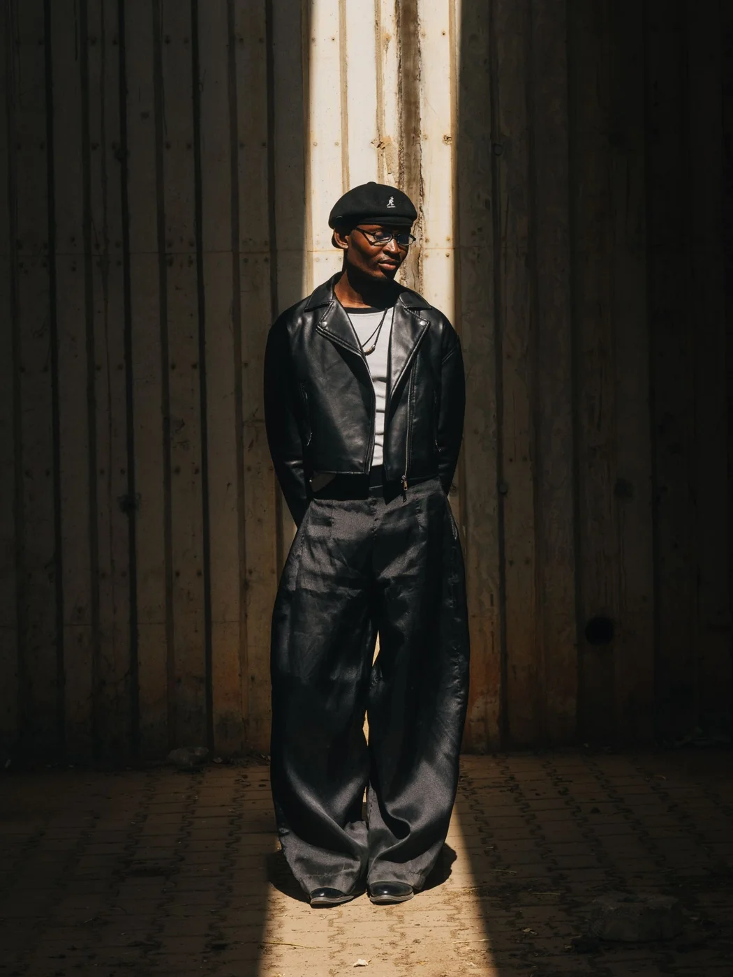 Wide-leg trousers worn with a dark jacket