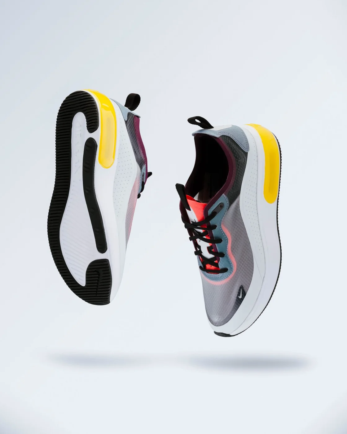 Pair of sneakers on a plain background
