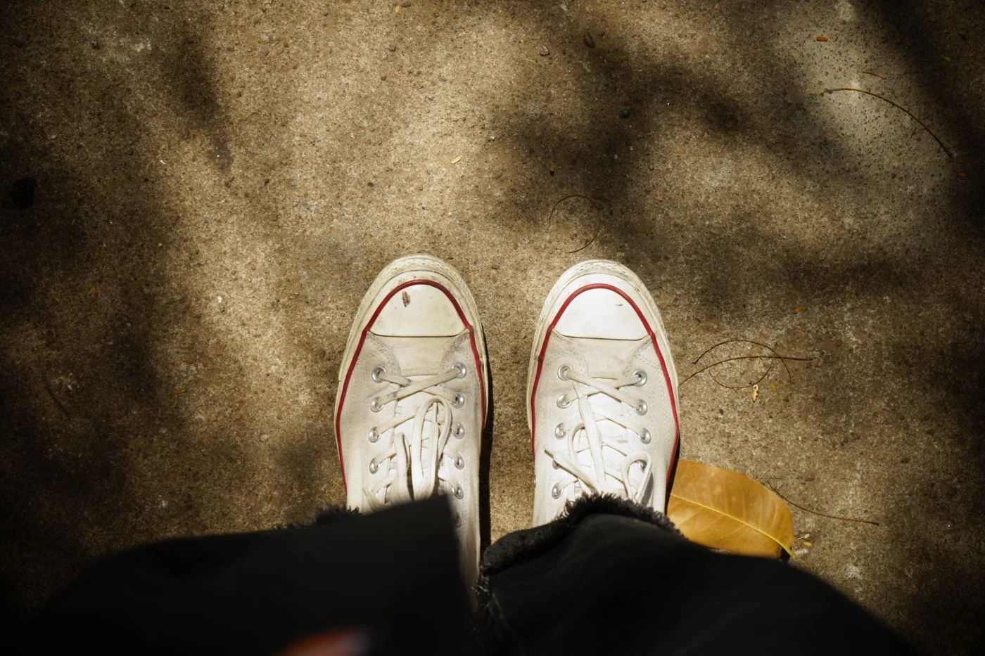 White Sneakers in Close Up Photography