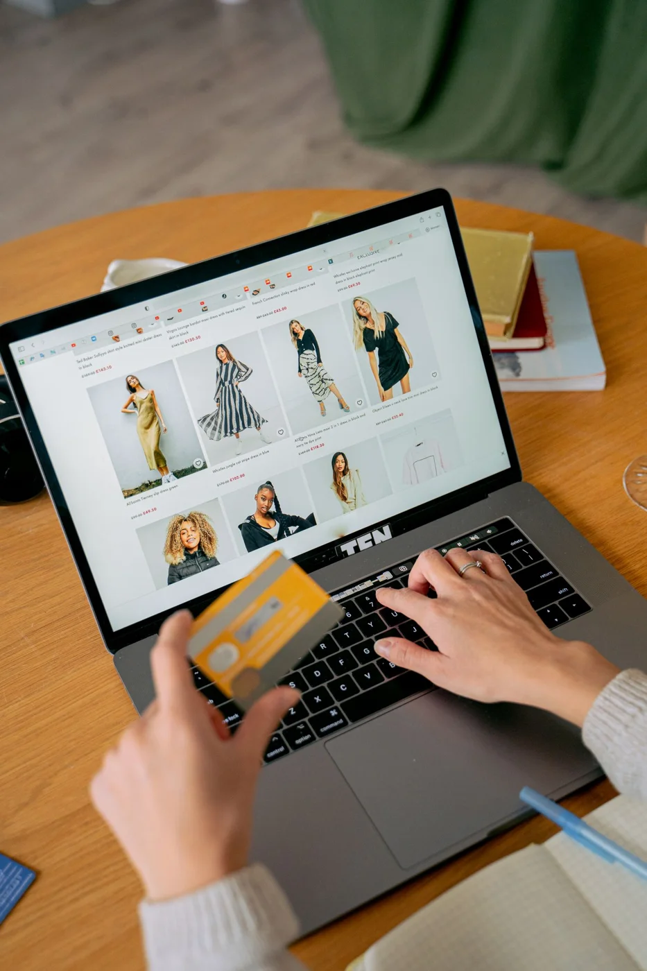 Clothing purchase being reviewed on a laptop
