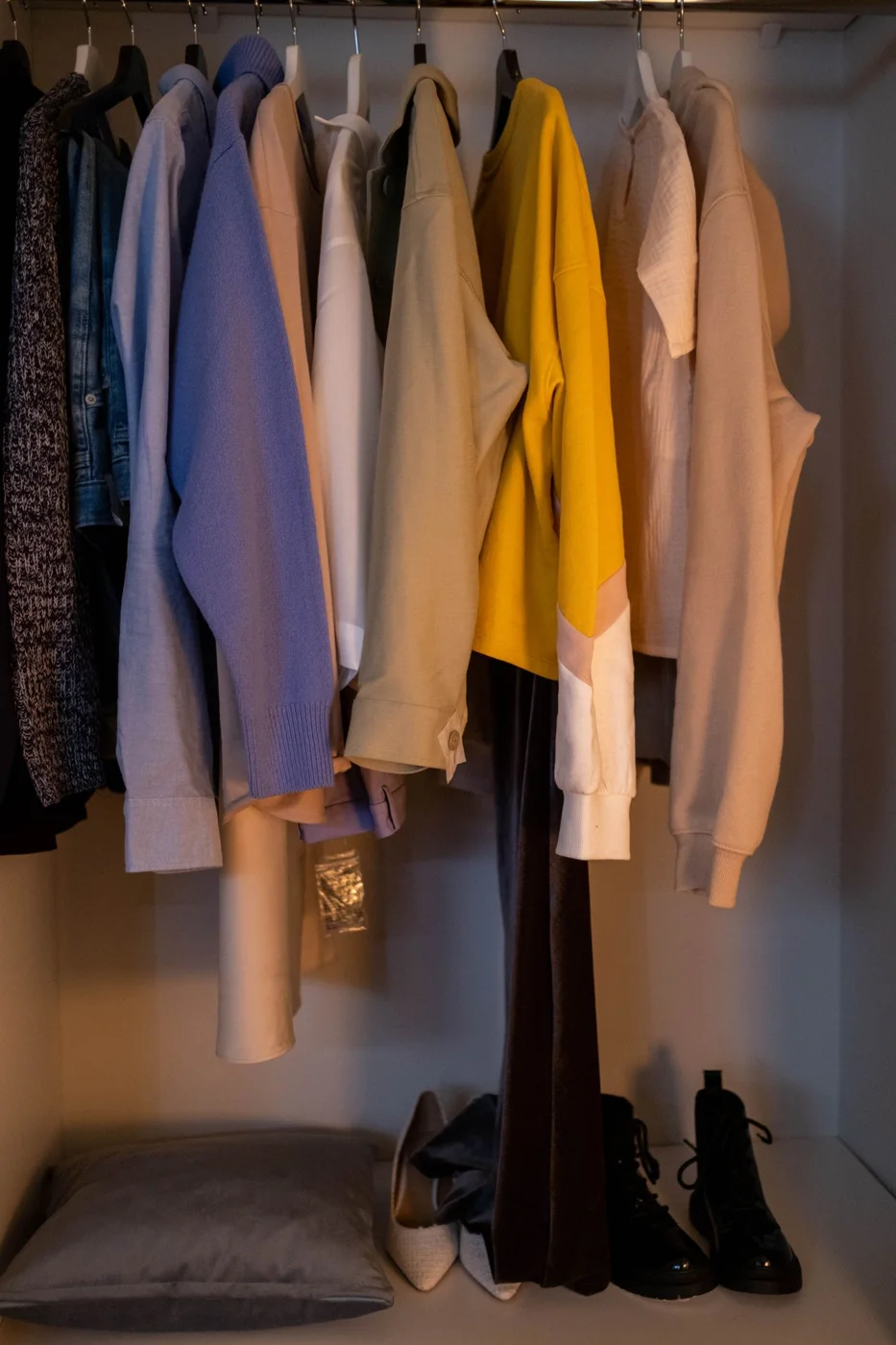 Clothes Hanging in Wardrobe
