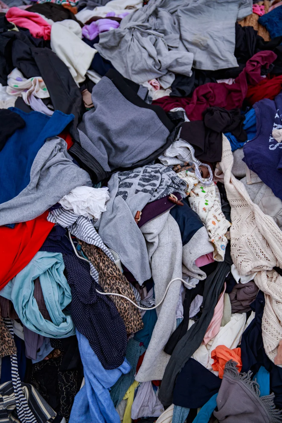 A varied pile of colorful clothing